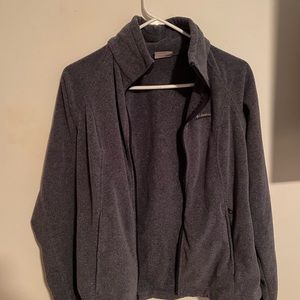 A dark grey Columbia flease Medium sized Jacket, turtleneck, all zippers work